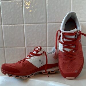 On Cloud Running Red and White Sneakers